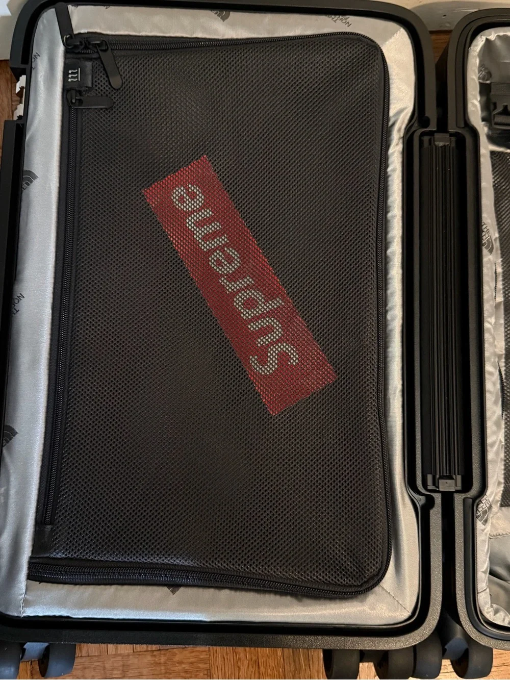 The North Face Black Grid-Panel Carry-On Spinner